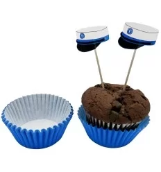 Muffins forme med blå studenterhue på pind